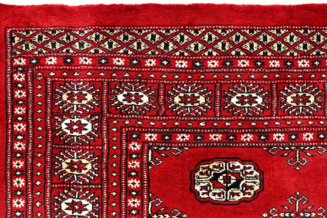 Red Pakistani Bokhara Rug 6' x 9'2" Hand-Knotted | No. QA58108