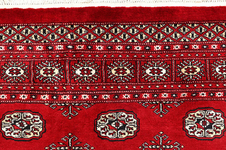 Red Pakistani Bokhara Rug 6' x 9'2" Hand-Knotted | No. QA58108