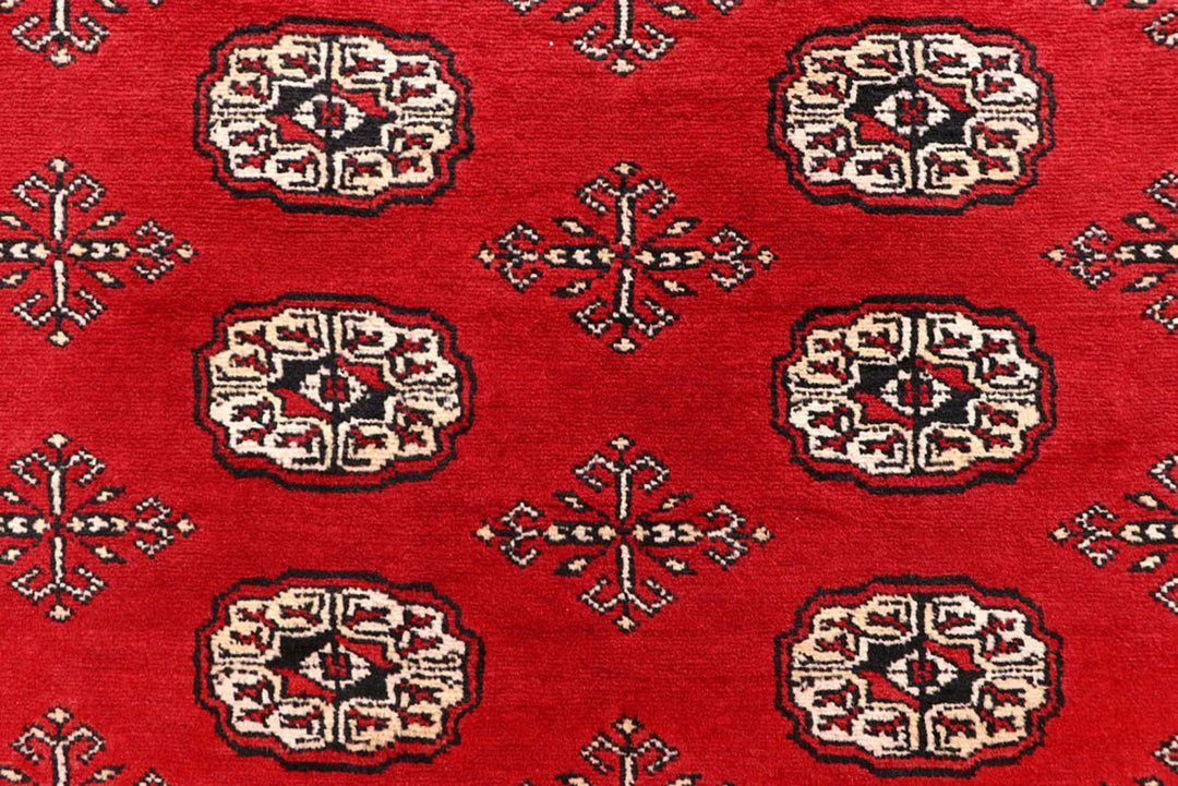 Red Pakistani Bokhara Rug 6' x 9'2" Hand-Knotted | No. QA58108