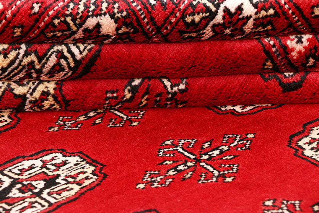 Red Pakistani Bokhara Rug 6' x 9'2" Hand-Knotted | No. QA58108