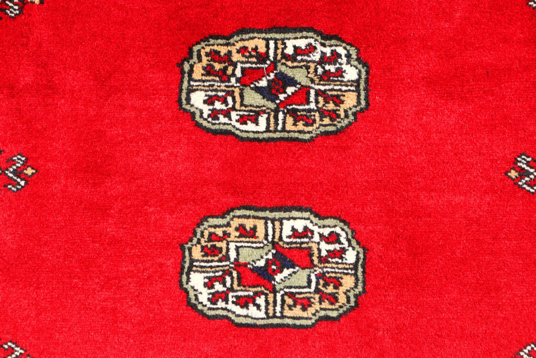 Red Pakistani Bokhara Rug 3' 1" x 4' 11" Hand-Knotted | No. QA58808