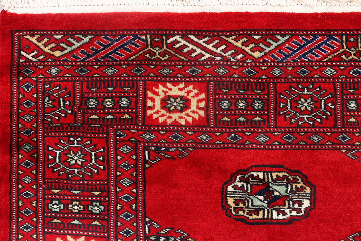 Firebrick Red Pakistani Bokhara Rug 4' 1" x 5' 4" Hand-Knotted | No. QA58926