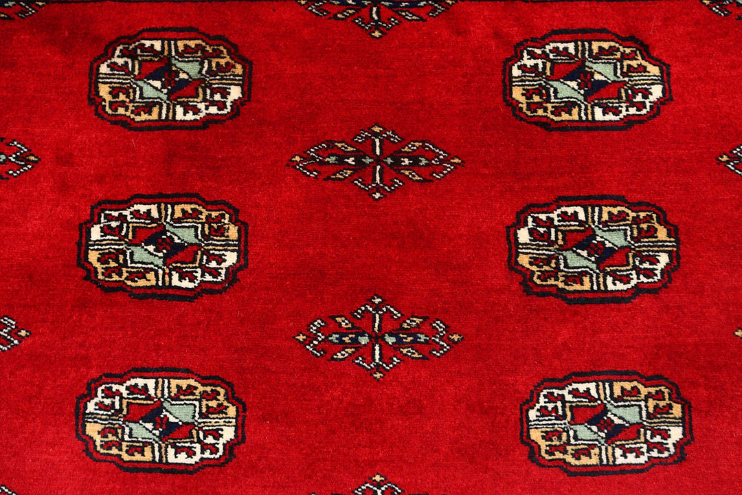 Firebrick Red Pakistani Bokhara Rug 4' 1" x 5' 4" Hand-Knotted | No. QA58926