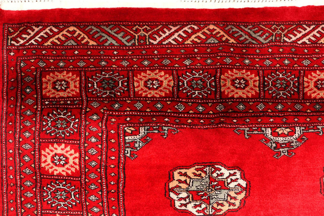 Red Pakistani Bokhara Rug 4' 6" x 7' 3" Hand-Knotted | No. QA59015