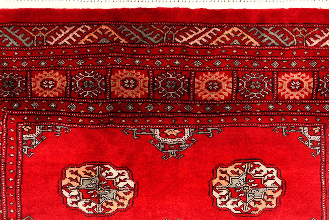 Red Pakistani Bokhara Rug 4' 6" x 7' 3" Hand-Knotted | No. QA59015