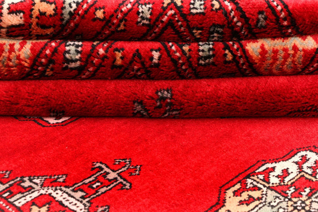 Red Pakistani Bokhara Rug 4' 6" x 7' 3" Hand-Knotted | No. QA59015