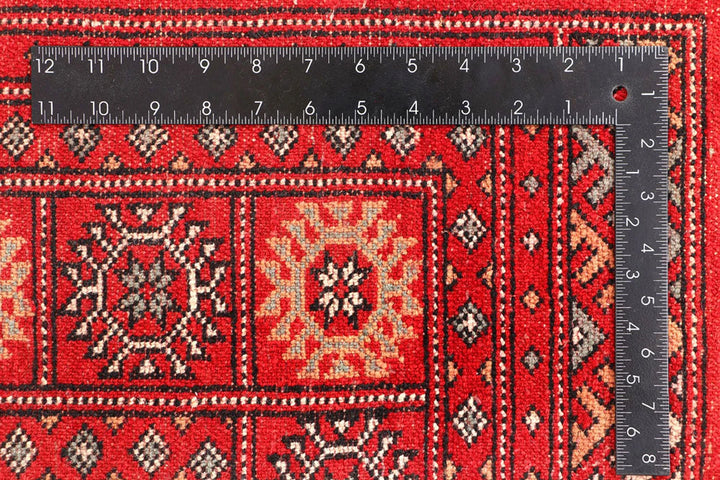 Red Pakistani Bokhara Rug 4' 6" x 7' 3" Hand-Knotted | No. QA59015