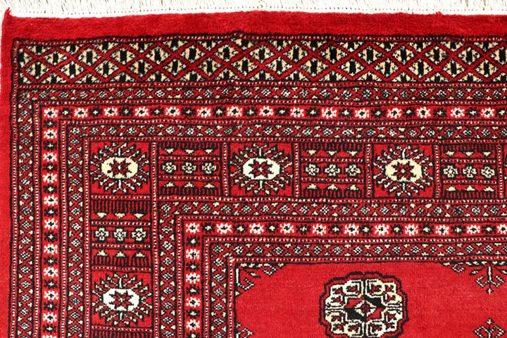Firebrick Red Pakistani Bokhara Rug 6' 8" x 10' Hand-Knotted | No. QA59141