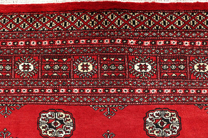 Firebrick Red Pakistani Bokhara Rug 6' 8" x 10' Hand-Knotted | No. QA59141