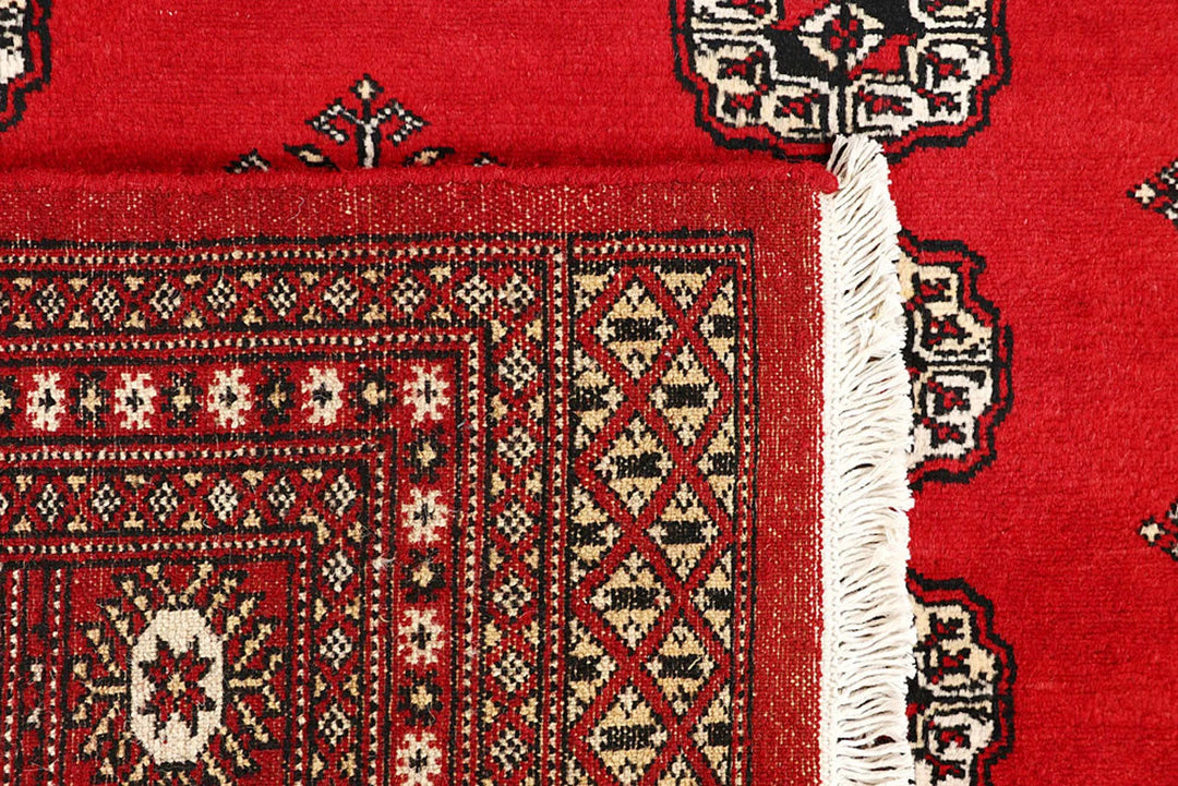 Firebrick Red Pakistani Bokhara Rug 6' 8" x 10' Hand-Knotted | No. QA59141