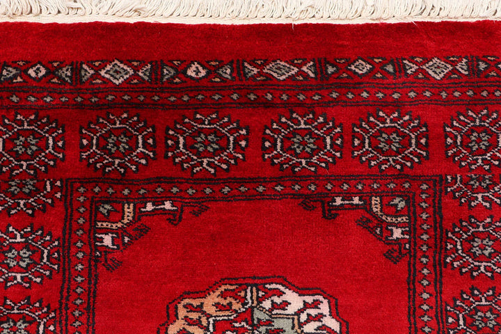Red Pakistani Bokhara Rug 2' 6" x 9' 11" Hand-Knotted | No. QA59464