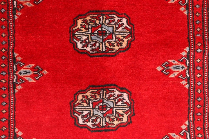 Red Pakistani Bokhara Rug 2' 7" x 8' 11" Hand-Knotted | No. QA59573