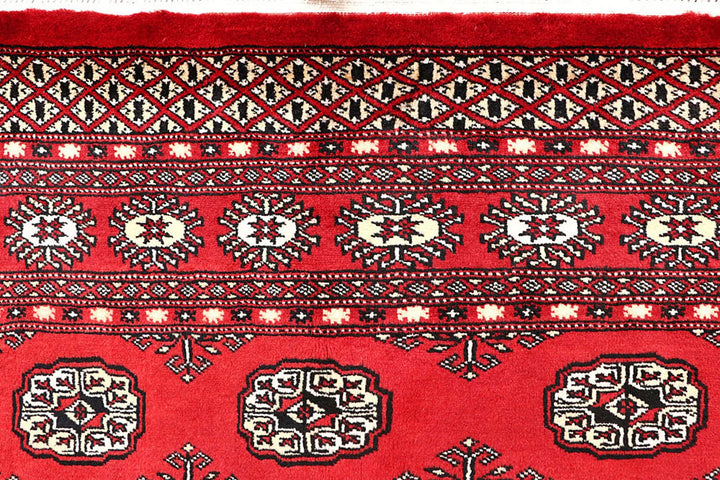Red Bokhara Rug 4' 11" x 8' 6" Hand-Knotted | No. QA60197