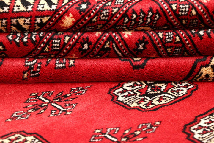 Red Bokhara Rug 4' 11" x 8' 6" Hand-Knotted | No. QA60197