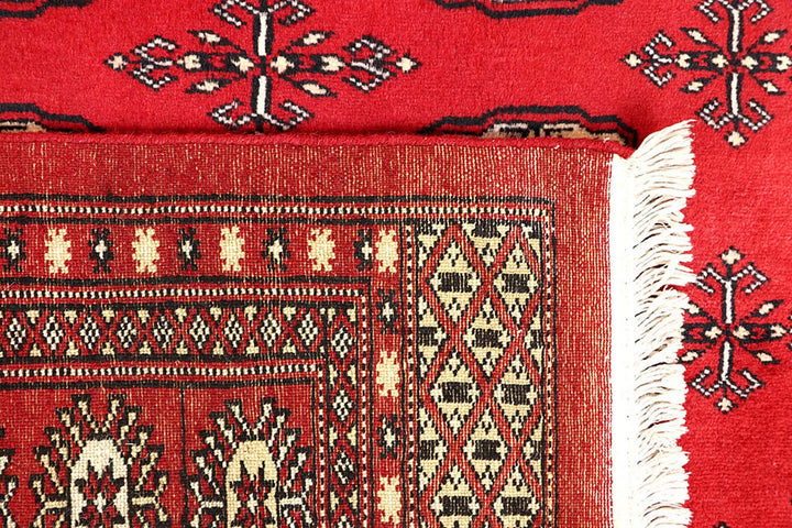 Red Bokhara Rug 4' 11" x 8' 6" Hand-Knotted | No. QA60197