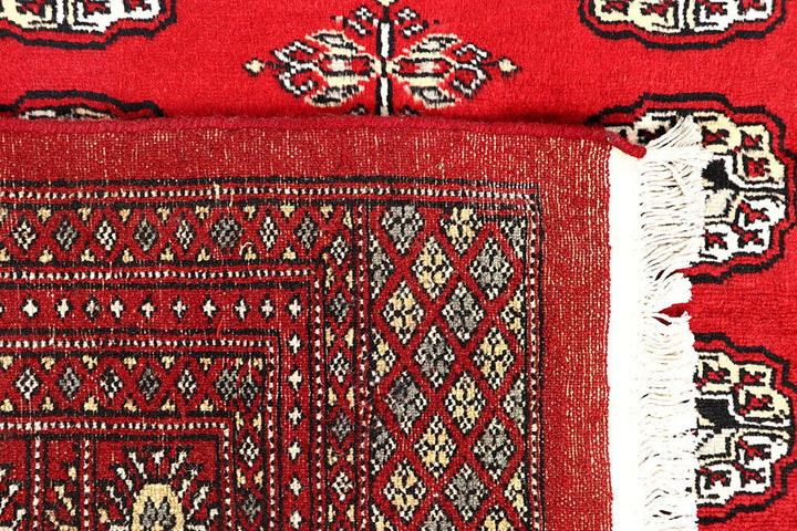 Red Pakistani Bokhara Rug 6' 3" x 8' 10" Hand-Knotted | No. QA60703