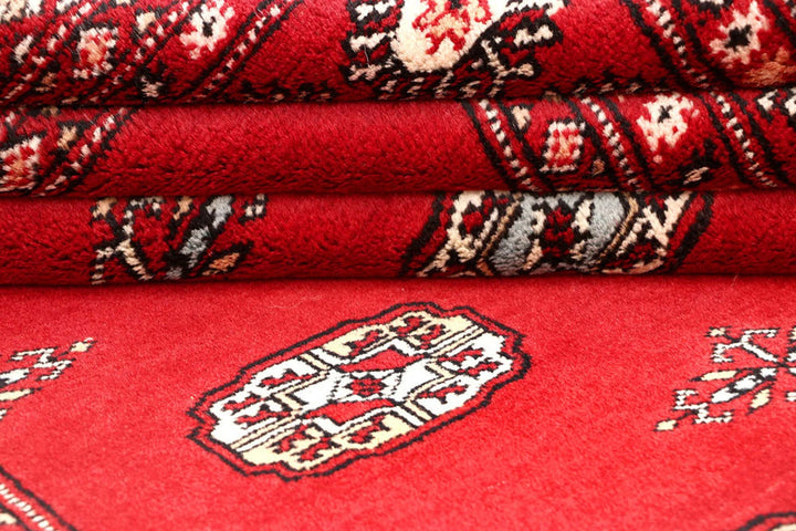 Red Pakistani Bokhara Rug 4' 2" x 6' 6" Hand-Knotted | No. QA61172