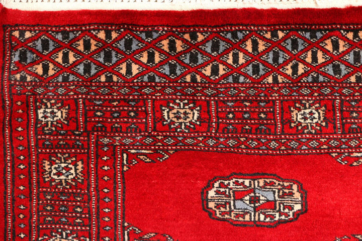 Red Pakistani Bokhara Rug 2' 7" x 9' 3" Hand-Knotted | No. QA61441