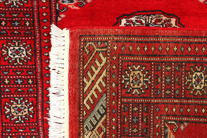 Red Pakistani Bokhara Rug 2' 7" x 9' 3" Hand-Knotted | No. QA61441