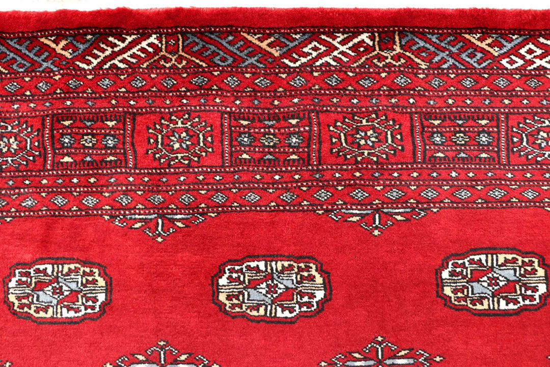 Firebrick Red Pakistani Bokhara Rug 5' x 8'4" Hand-Knotted | No. QA61482