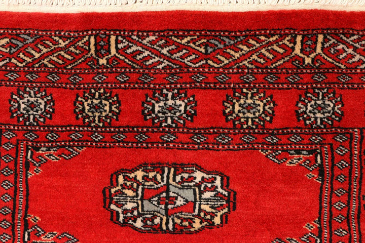 Red Pakistani Bokhara Rug 2' 6" x 10' Hand-Knotted | No. QA61485