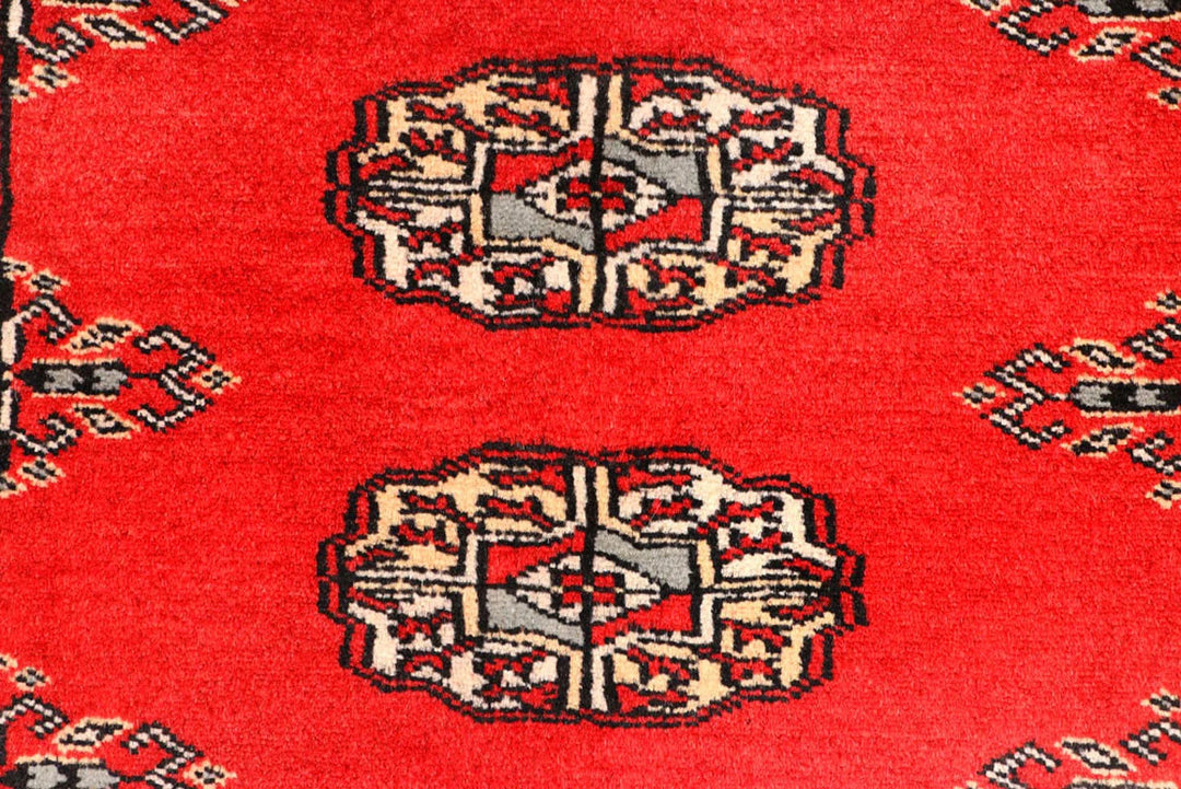 Red Pakistani Bokhara Rug 2' 6" x 10' Hand-Knotted | No. QA61485