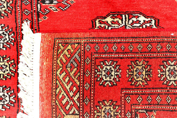 Red Pakistani Bokhara Rug 2' 6" x 10' Hand-Knotted | No. QA61485