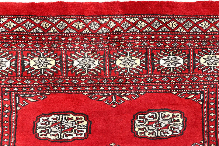 Red Pakistani Bokhara Rug 4' 2" x 6' 5" Hand-Knotted | No. QA61648