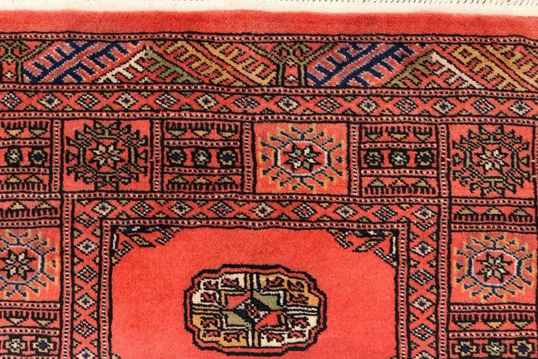 Salmon Pakistani Bokhara Rug 2' 5" x 10' 3" Hand-Knotted | No. QA62176