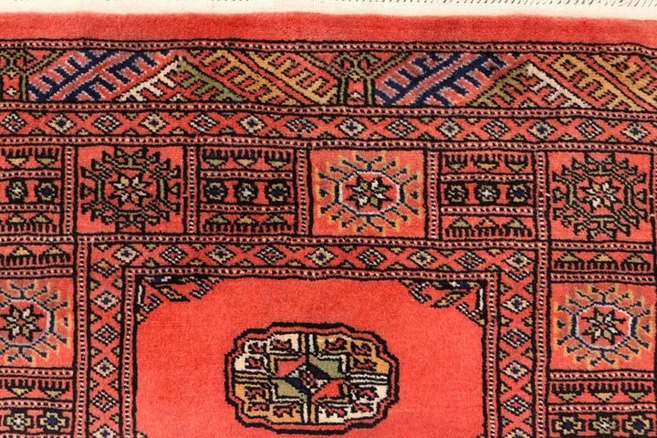 Salmon Pakistani Bokhara Rug 2' 5" x 10' 3" Hand-Knotted | No. QA62176