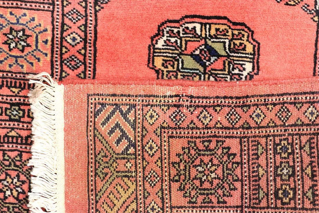 Salmon Pakistani Bokhara Rug 2' 5" x 10' 3" Hand-Knotted | No. QA62176