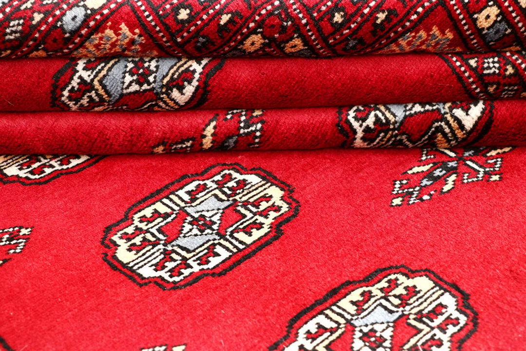 Red Pakistani Bokhara Rug 4' 2" x 6' Hand-Knotted | No. QA62227