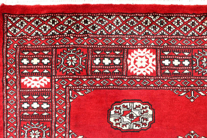Red Pakistani Bokhara Rug 4' 1" x 6' 6" Hand-Knotted | No. QA62313