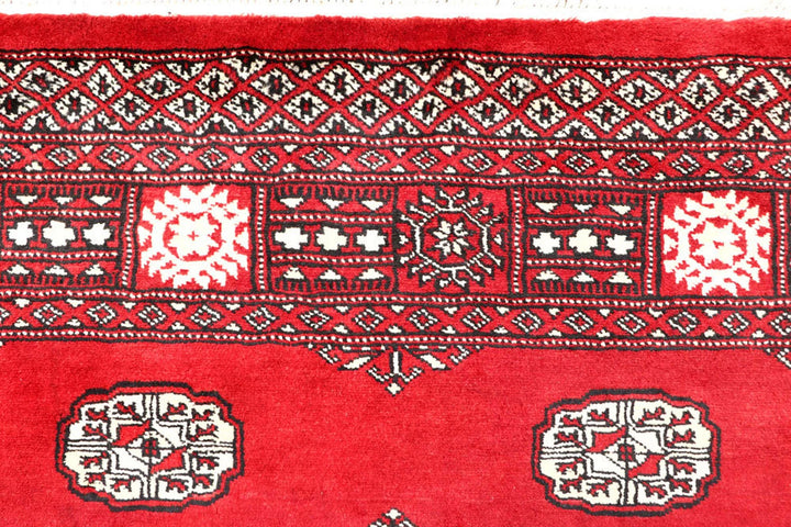Red Pakistani Bokhara Rug 4' 1" x 6' 6" Hand-Knotted | No. QA62313