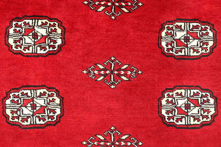 Red Pakistani Bokhara Rug 4' 1" x 6' 6" Hand-Knotted | No. QA62313