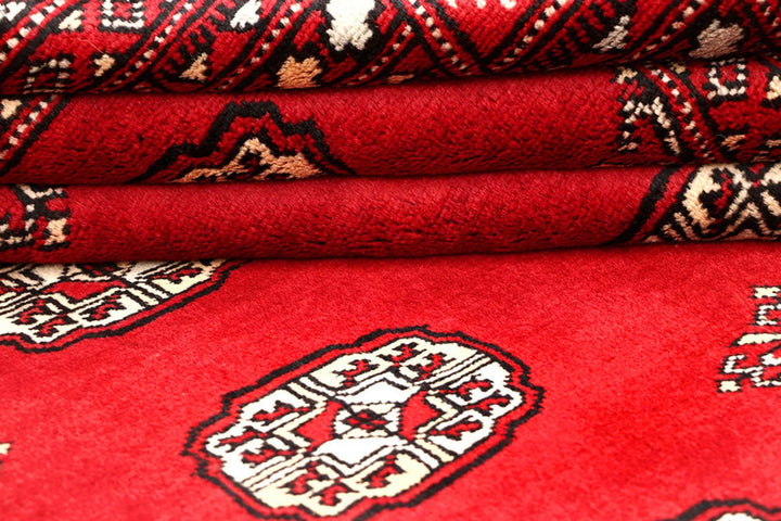 Red Pakistani Bokhara Rug 4' 1" x 6' 6" Hand-Knotted | No. QA62313