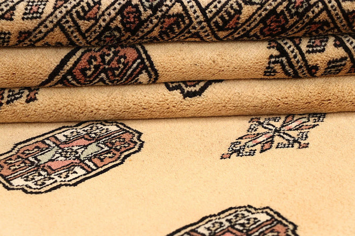 Brown Pakistani Bokhara Rug 4' 1" x 6' 1" Hand-Knotted | No. QA62843