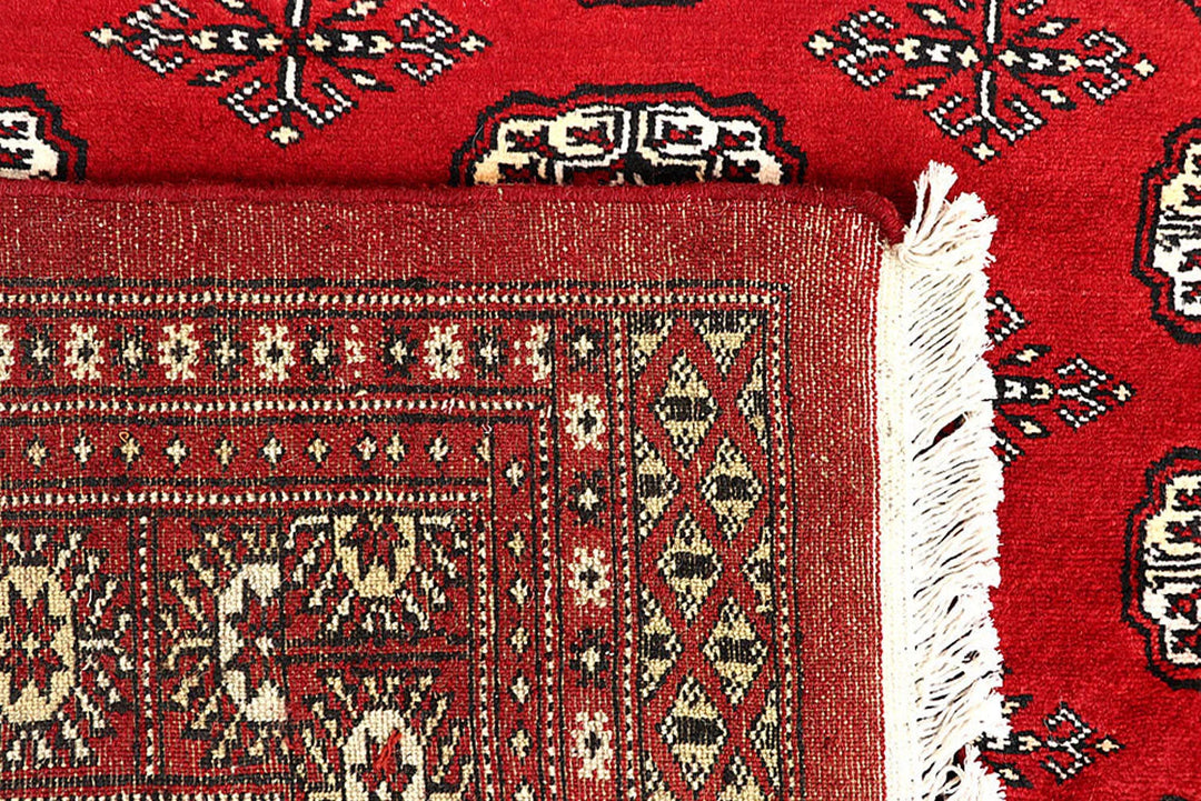 Red Bokhara Rug 6' 2" x 8' 10" Hand-Knotted | No. QA62859