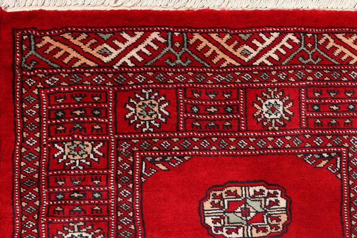 Red Pakistani Bokhara Rug 2' 6" x 10' Hand-Knotted | No. QA63344