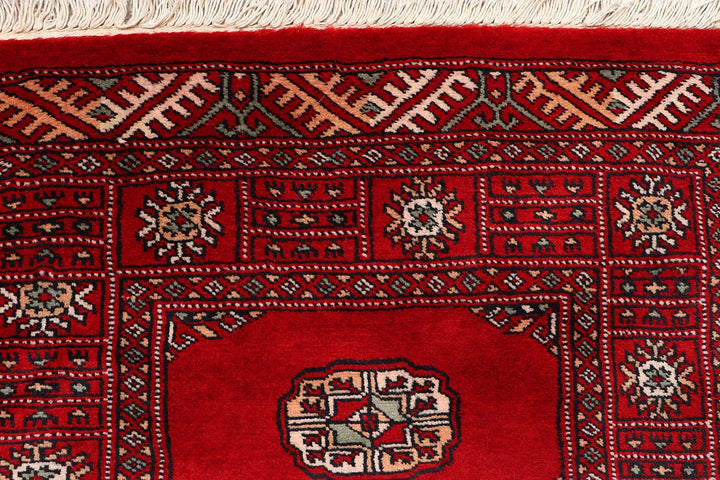 Red Pakistani Bokhara Rug 2' 6" x 10' Hand-Knotted | No. QA63344