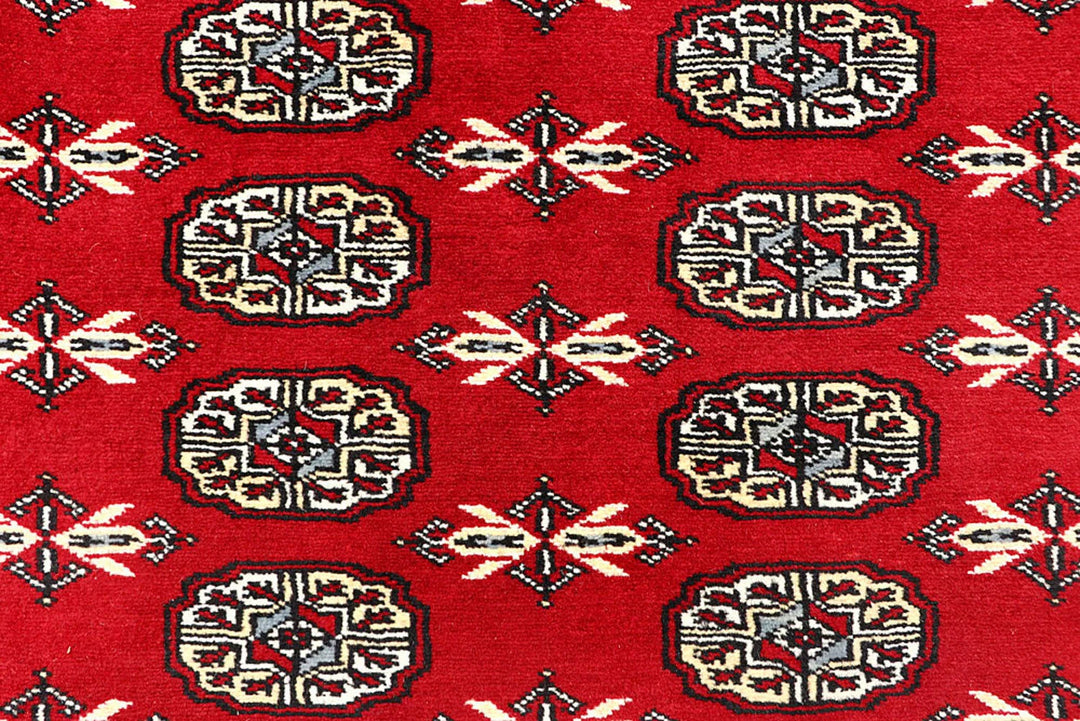 Red Pakistani Bokhara Rug 6' 3" x 9' Hand-Knotted | No. QA63452