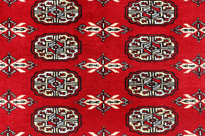 Red Pakistani Bokhara Rug 6' 3" x 9' Hand-Knotted | No. QA63452