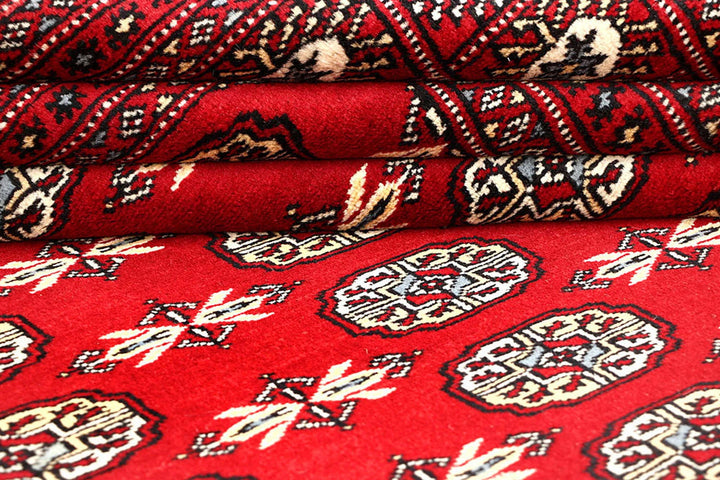 Red Pakistani Bokhara Rug 6' 3" x 9' Hand-Knotted | No. QA63452