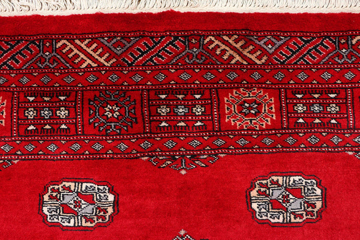 Red Pakistani Bokhara Rug 4' 2" x 6' 8" Hand-Knotted | No. QA63971