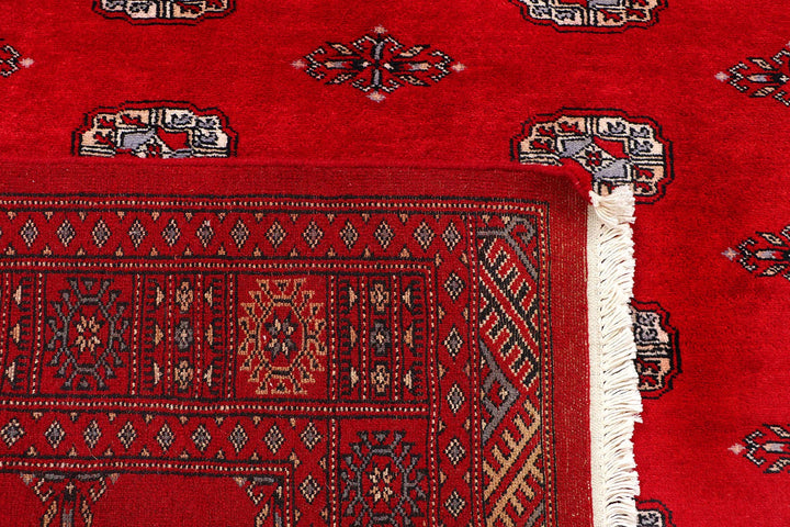 Red Pakistani Bokhara Rug 4' 2" x 6' 8" Hand-Knotted | No. QA63971