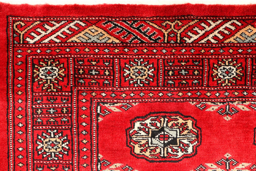 Red Pakistani Bokhara Rug 3' 3" x 5' 7" Hand-Knotted | No. QA64546