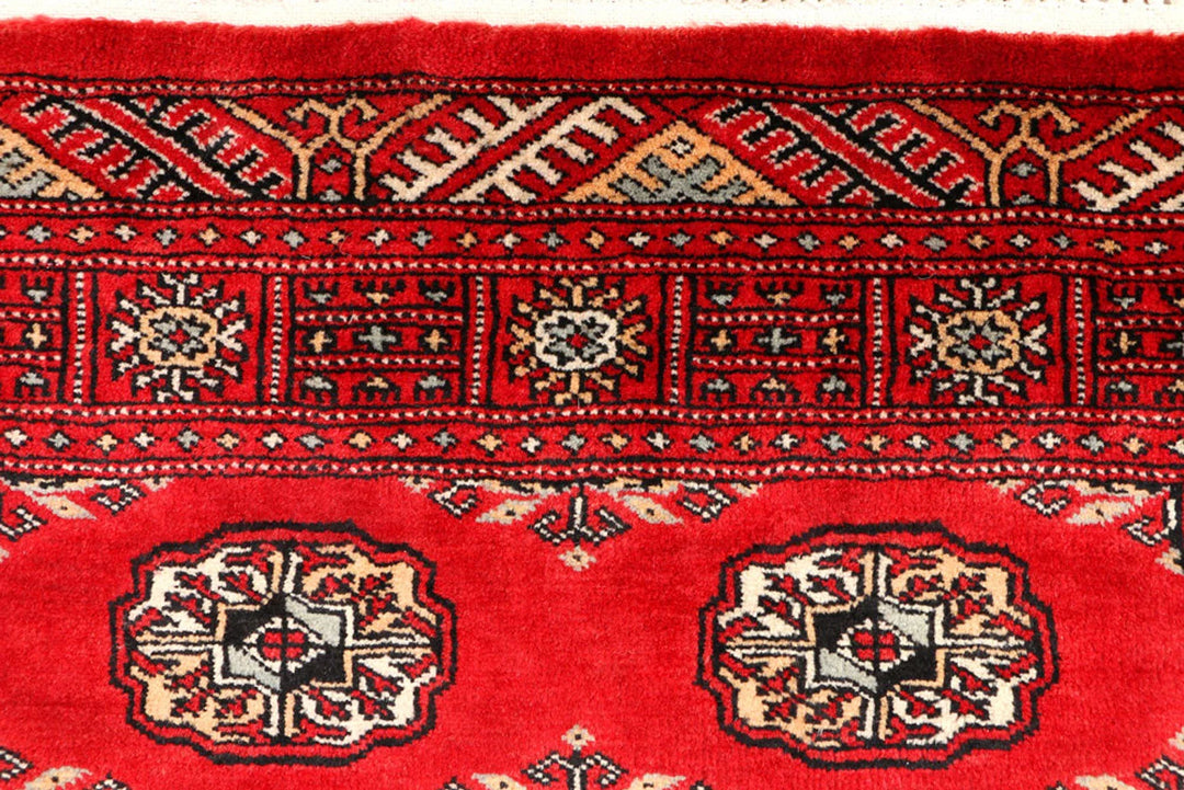 Red Pakistani Bokhara Rug 3' 3" x 5' 7" Hand-Knotted | No. QA64546