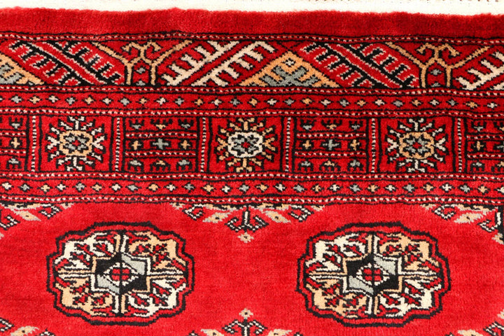 Red Pakistani Bokhara Rug 3' 3" x 5' 7" Hand-Knotted | No. QA64546