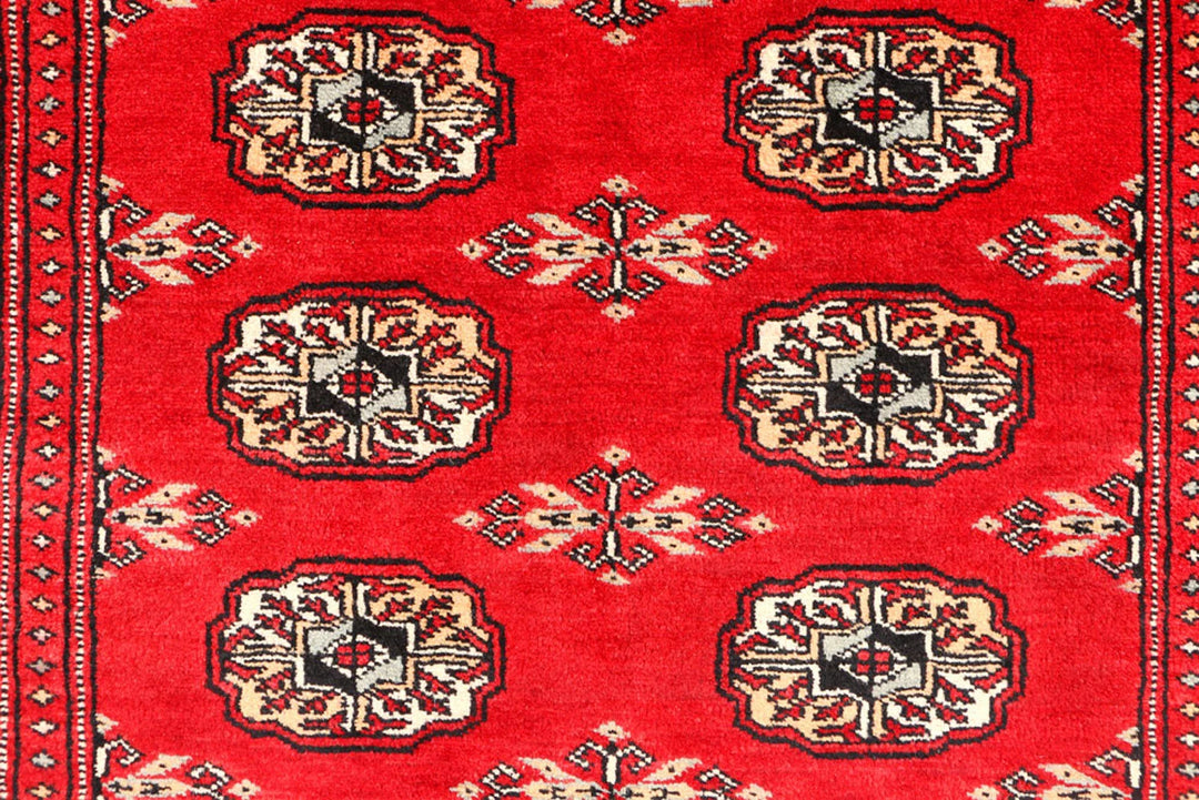 Red Pakistani Bokhara Rug 3' 3" x 5' 7" Hand-Knotted | No. QA64546