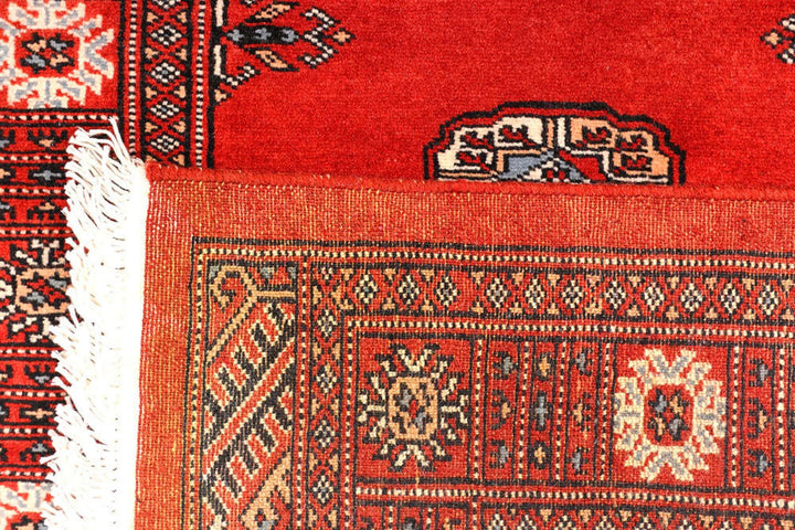Firebrick Pakistani Bokhara Runner 2' 7" x 11' 1" Hand-Knotted | No. QA65763